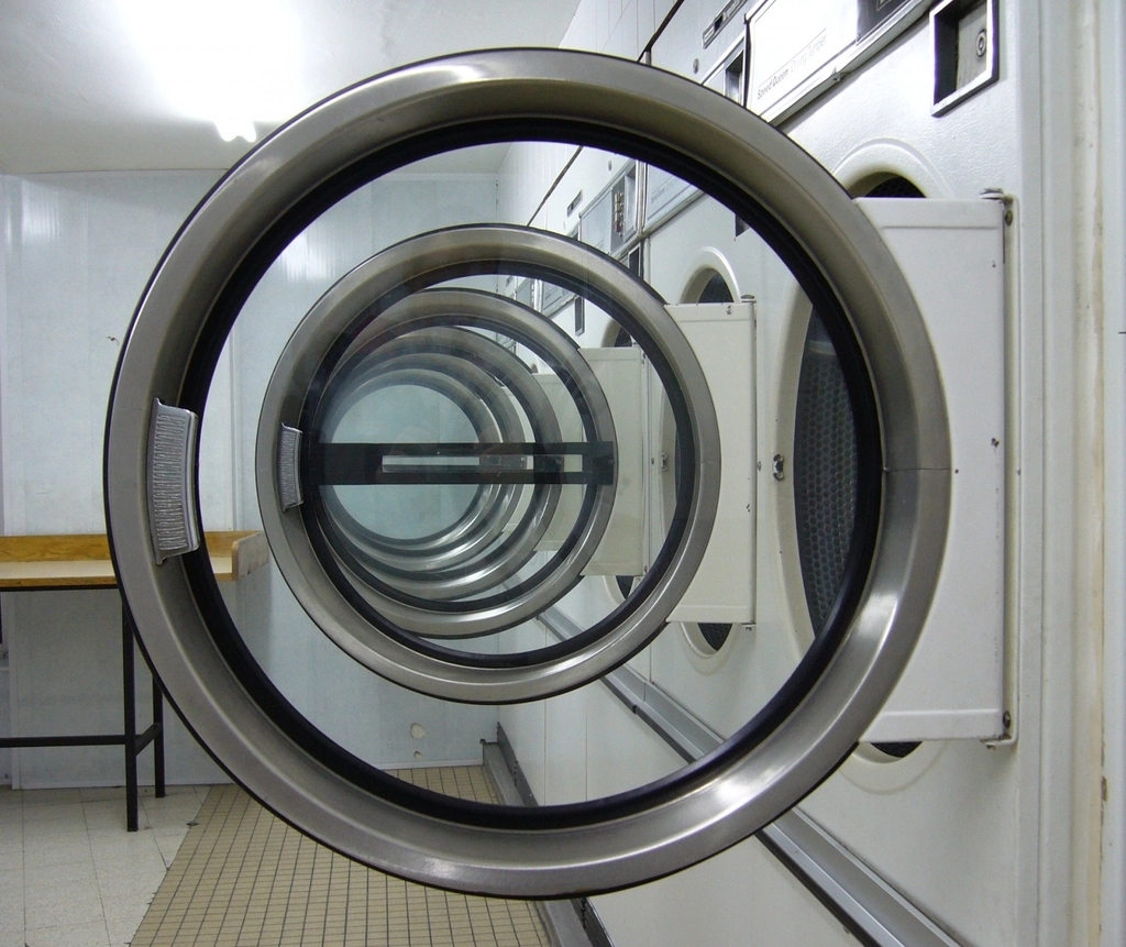 Commercial washing machine with its door open